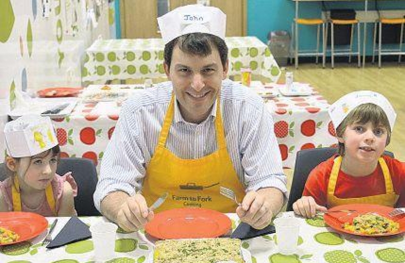 John at cookery class with primary age children