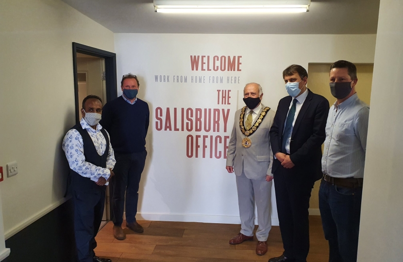 John stood in the reception of the Salisbury Office with Cllr Hoque, The Salisbury Mayor and the Office team.