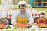 John at cookery class with primary age children